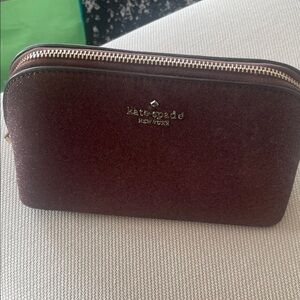 Kate Spade Maroon Zip clutch/cosmetic bag